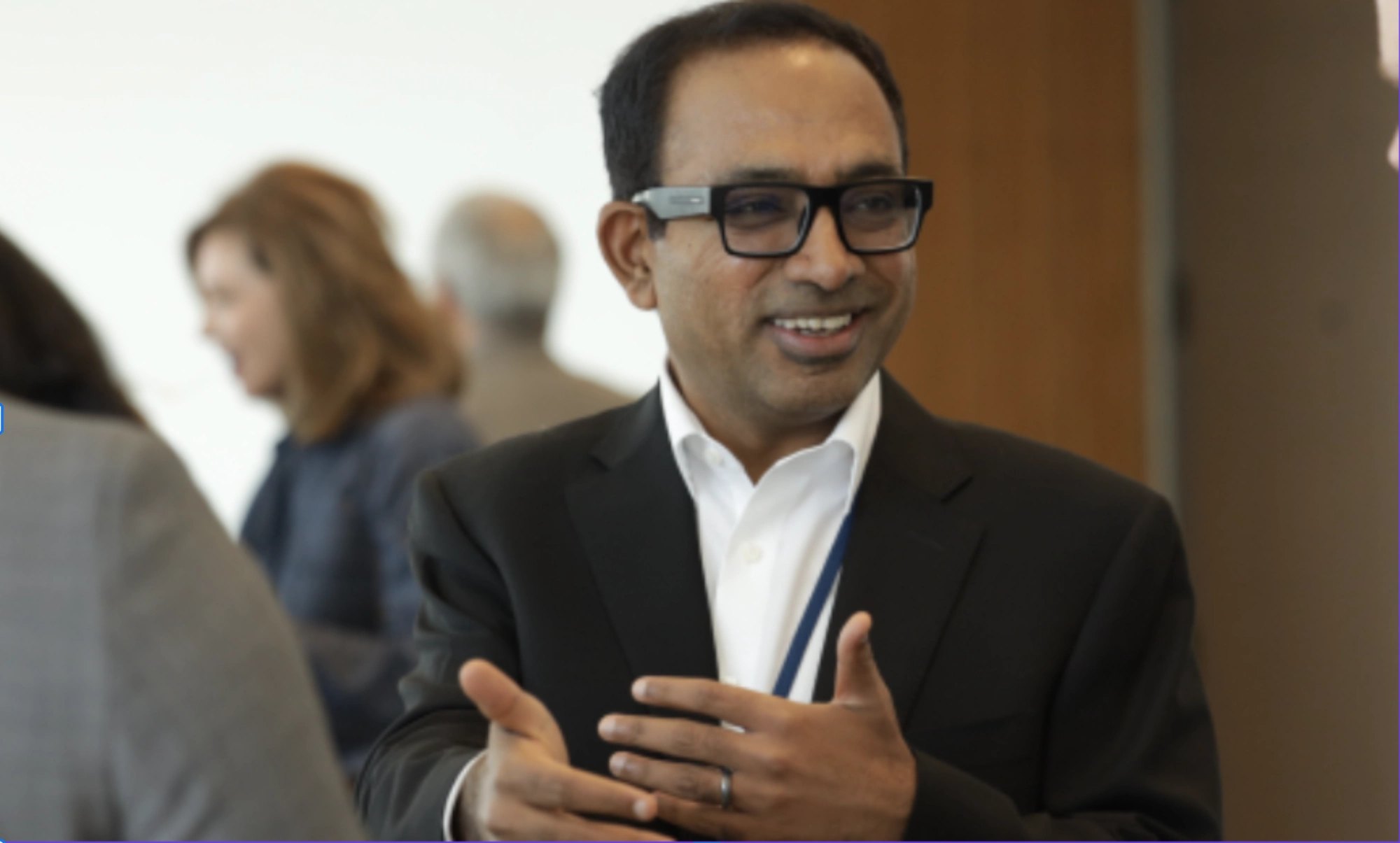 Speaker in conversation during a session